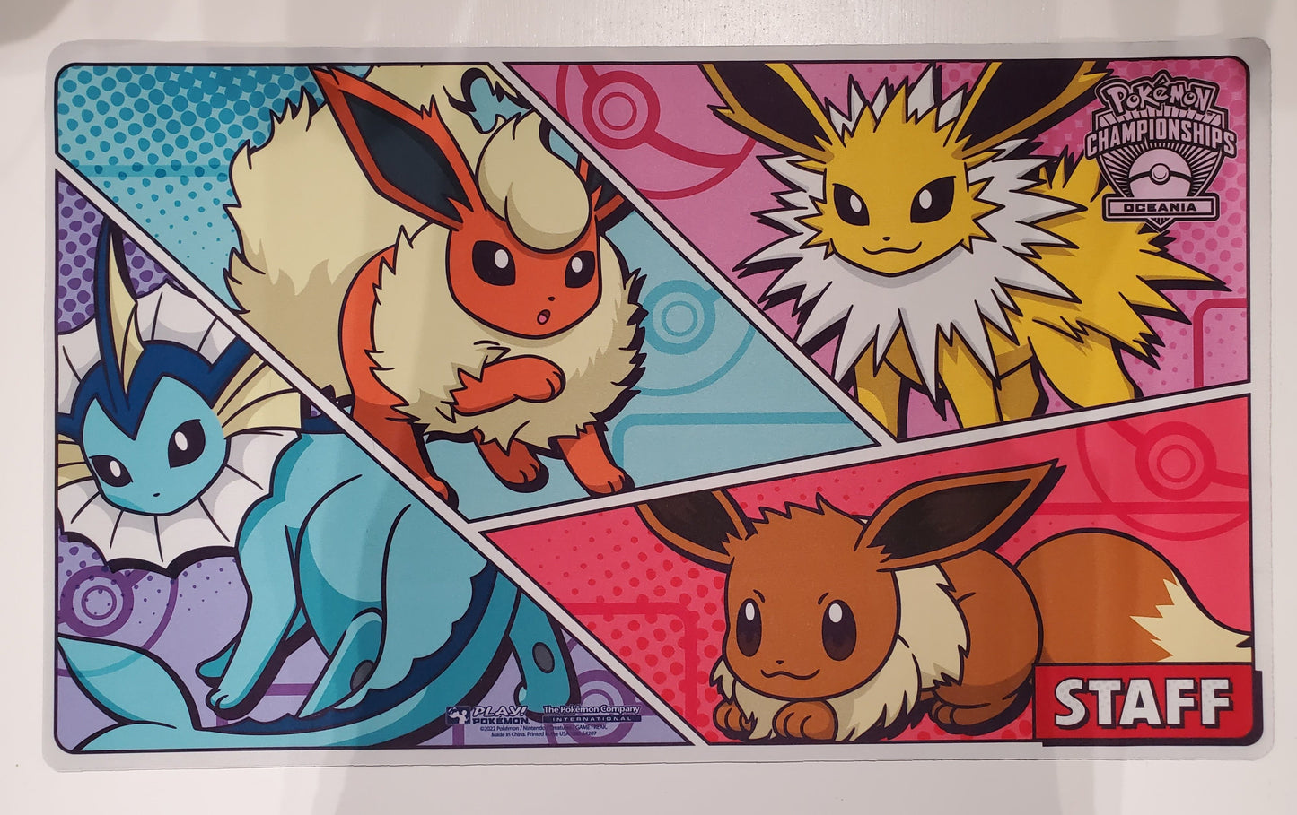 2023 OCIC Eevee Staff playmat